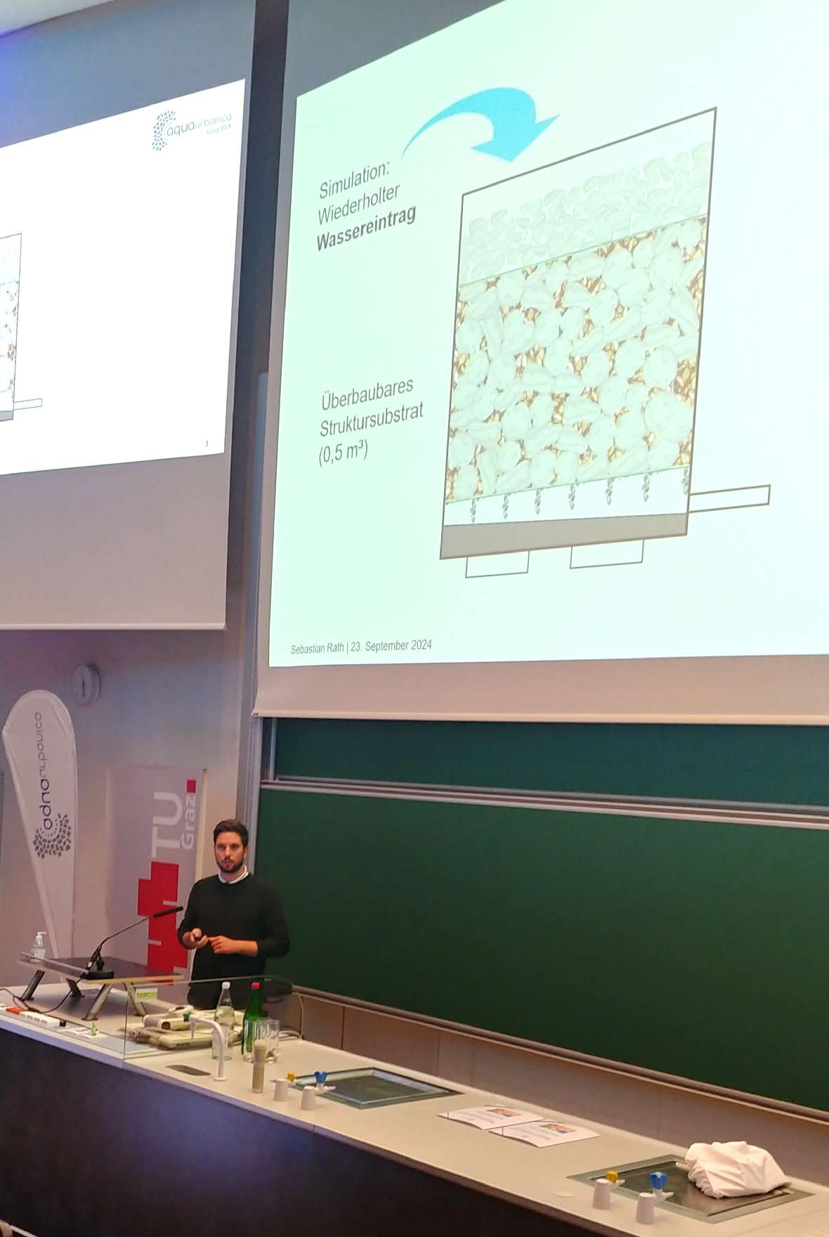 Das Foto zeigt den Hörsaal an der Technischen Universität Graz beim Vortrag des BAW-Mitarbeiters Sebastian Rath.